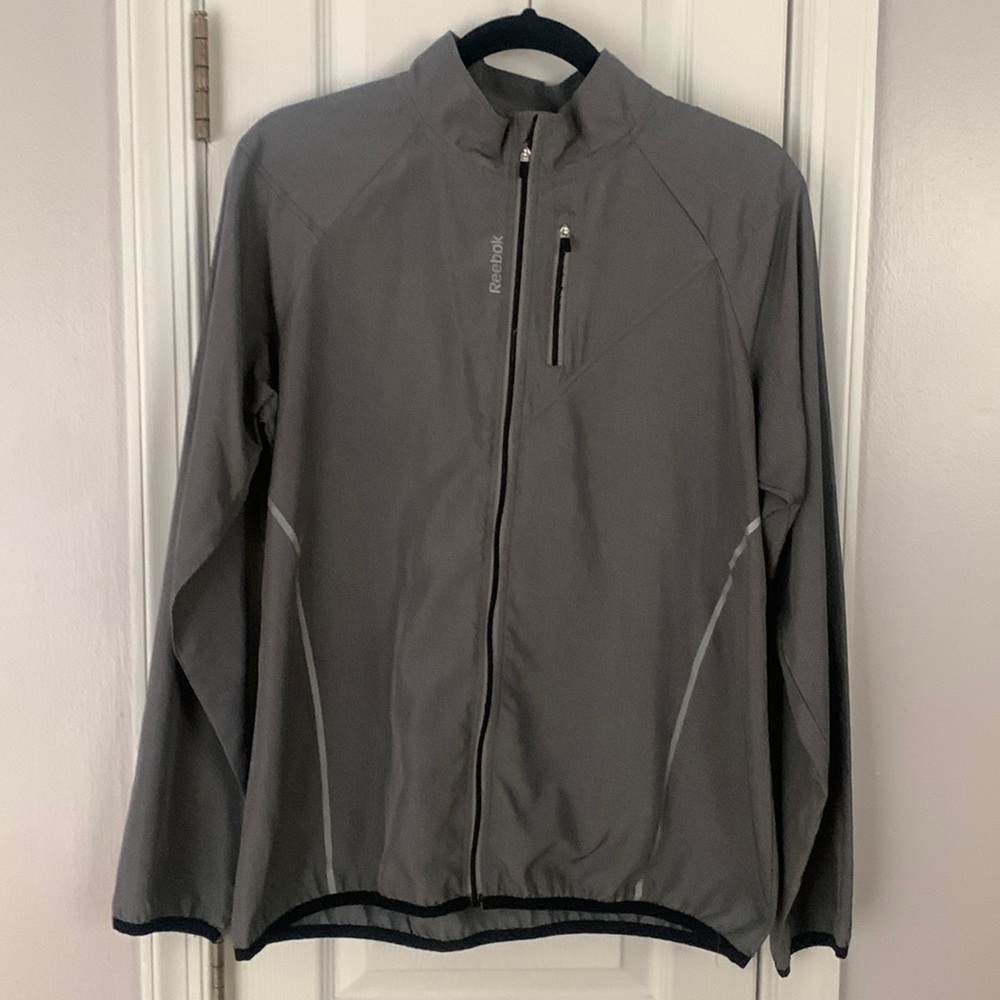 Thin Reebok Jacket 100% Polyester can  fit XL